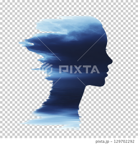 Silhouette of person profile is creatively blended with dramatic sky and ocean scene, evoking sense of tranquility and introspection. image combines nature and human form seamlessly 129702292