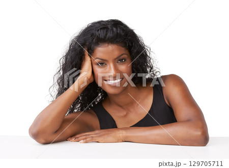 Portrait, beauty and mockup with a model indian woman in studio isolated on a white background for a product or brand. Face, happy and smile with a young female posing to promote product placement 129705711