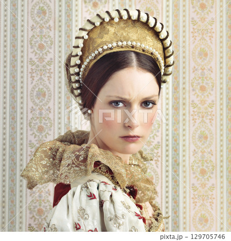 Renaissance, royalty and portrait of Victorian queen for luxury, history and vintage in England. Medieval, fantasy and beauty with face of woman in regal dress costume for leader, fashion and elegant Renaissance, royalty and portrait of Victorian queen for luxury, history and vintage in England. Medieval, fantasy and beauty with face of woman in regal dress costume for leader, fashion and elegant 129705746