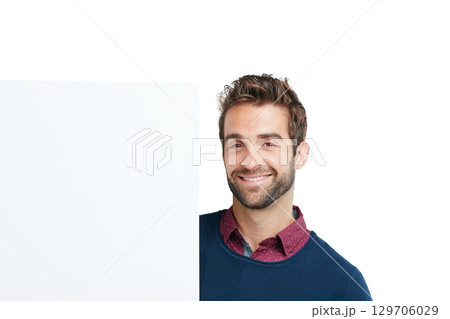 Portrait, studio and man with a board with mockup space for marketing, advertising or product placement. Happy, smile and male model with a banner, poster or signage isolated by a white background. 129706029