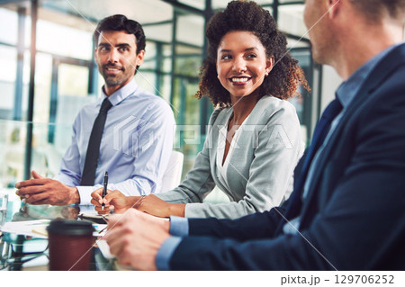 Meeting, collaboration or diversity and a business black woman in the boardroom with her corporate team. Teamwork, planning and strategy with a female employee writing in the office during a workshop Meeting, collaboration or diversity and a business black woman in the boardroom with her corporate team. Teamwork, planning and strategy with a female employee writing in the office during a workshop 129706252