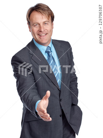 Studio portrait, businessman and hand shake with suit, focus and deal in leadership by white background. Happy corporate leader, motivation or isolated for shaking hands, welcome and company vision 129706387