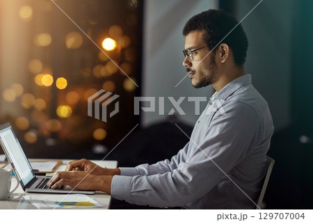 Teamwork, review and night with business people at laptop for project management, planning or web design. Collaboration, goal and documents with employee in digital agency for marketing strategy Teamwork, review and night with business people at laptop for project management, planning or web design. Collaboration, goal and documents with employee in digital agency for marketing strategy 129707004