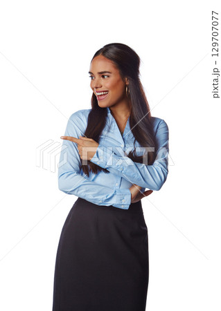 Happy, business and woman pointing her finger in studio for advertising, marketing or mockup. Happiness, smile and female model with corporate, classy and elegant outfit isolated by white background. 129707077