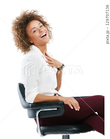 Business woman, smile and laughing in chair while sitting against white studio background. Portrait of isolated happy female worker smiling in happiness and laugh for joke or meme on white background 129707136