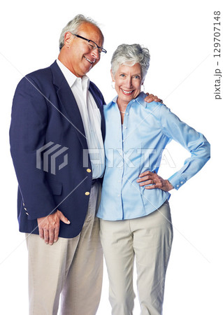 Love, smile and portrait of senior couple standing in studio, isolated on white background. Retirement, happy and healthy relationship, romance for elderly man with woman together in formal clothes. Love, smile and portrait of senior couple standing in studio, isolated on white background. Retirement, happy and healthy relationship, romance for elderly man with woman together in formal clothes. 129707148