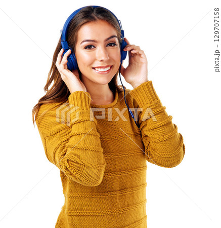 Music, headphones and portrait of woman in studio for music, audio and white background space. Radio, girl and face of happy, smile and model relax with streaming, track and playlist while isolated 129707158
