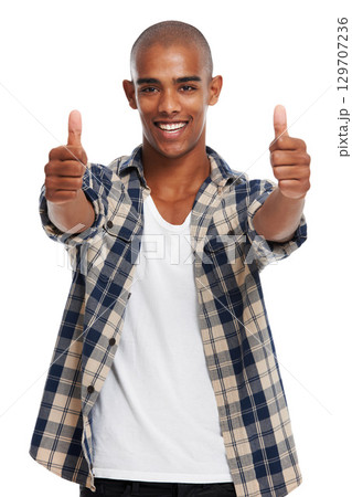 Young african man, success and thumbs up portrait of yes, achievement and winner hands sign. Thank you, happiness and ok agreement satisfaction hand gesture of a black man with motivation from goal 129707236