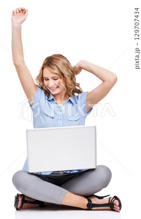 Business, laptop and woman excited, celebration and employee isolated on white studio background. Consultant, female entrepreneur and lady with computer, winner and website launch for startup company 129707434