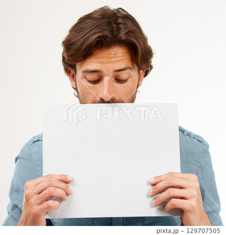 Man, hands and holding blank poster for marketing, advertising or message on mockup. Hand of male with white empty paper or billboard standing for copy space, branding or logo for advertisement Man, hands and holding blank poster for marketing, advertising or message on mockup. Hand of male with white empty paper or billboard standing for copy space, branding or logo for advertisement 129707505