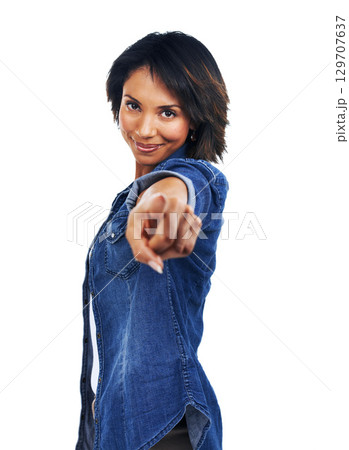 Portrait, pointing and choice with a black woman in studio isolated on a white background with a hand sign or gesture. Face, smile and happy with an attractive female choosing an option with a point 129707637