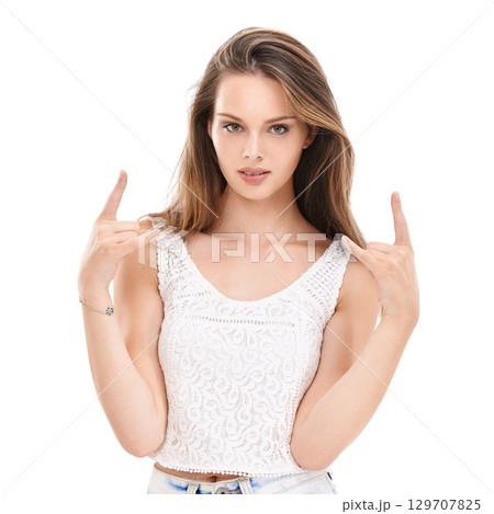 Portrait, hands or devil horns and a woman in studio isolated on a white background with a rock on hand gesture. Fashion, emoji and social media with a young attractive female standing on blank space 129707825