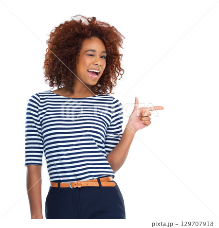 Woman portrait, wink and pointing at promotion, isolated advertising space and product placement marketing. Smile, happy or excited model in showing hands gesture for sales mockup on white background 129707918