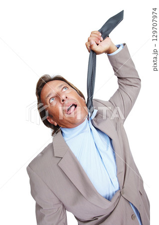 Depression, stress and businessman hanging from tie, suicide and mens mental health isolated on white background. Anxiety, burnout and man frustrated in necktie with work, debt and crisis in studio. 129707974
