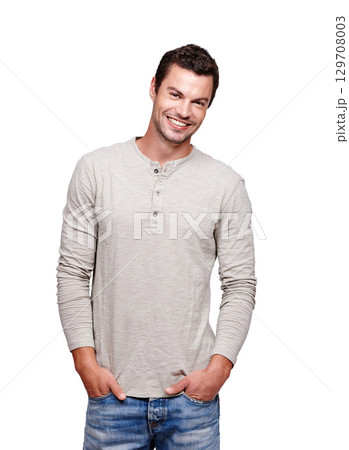 Portrait, fashion and cool with a man model in studio isolated on a white background looking happy. Smile, casual and modern with a handsome male posing in contemporary clothes for trendy style 129708003
