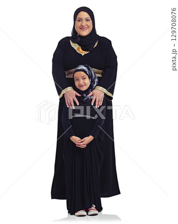 Islam, body portrait and mom and girl child happy in hijab together and isolated on white background. Love, family and support, Muslim woman with daughter smile and Islamic culture in studio in Egypt Islam, body portrait and mom and girl child happy in hijab together and isolated on white background. Love, family and support, Muslim woman with daughter smile and Islamic culture in studio in Egypt 129708076