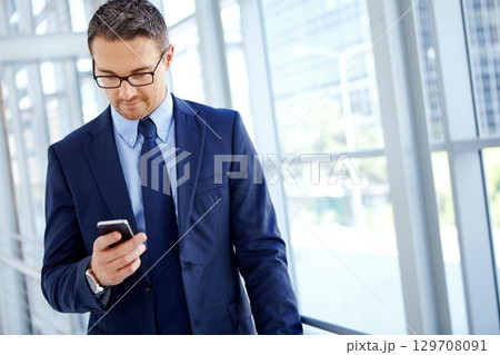 Business man, corporate or search with phone for internet research, social media content or networking. Tech, travel or manager in airport on smartphone for social network, blog review or media app Business man, corporate or search with phone for internet research, social media content or networking. Tech, travel or manager in airport on smartphone for social network, blog review or media app 129708091