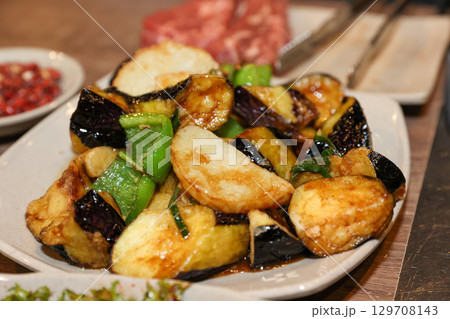 Stir-fried Potatoes, Eggplant, and Peppers. Chinese food Stir-fried Potatoes, Eggplant, and Peppers. Chinese food 129708143