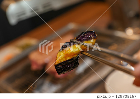 Stir-fried Potatoes, Eggplant, and Peppers. Chinese food 129708167