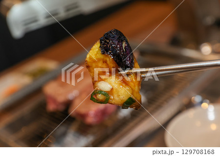 Stir-fried Potatoes, Eggplant, and Peppers. Chinese food 129708168