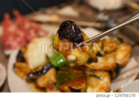 Stir-fried Potatoes, Eggplant, and Peppers. Chinese food Stir-fried Potatoes, Eggplant, and Peppers. Chinese food 129708170