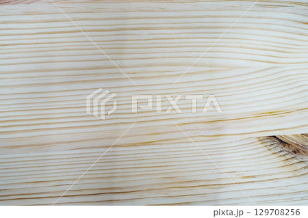 Close-up view of natural wood texture showcasing grain patterns and smooth surface details Close-up view of natural wood texture showcasing grain patterns and smooth surface details 129708256