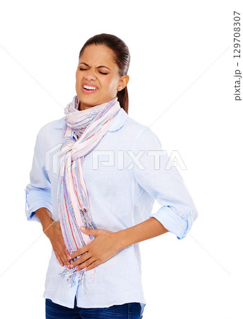 Colon, digestion or constipation and a model black woman in studio isolated on a white background with stomach pain. Menstruation, stomach ache and period with a hurt young female on blank space Colon, digestion or constipation and a model black woman in studio isolated on a white background with stomach pain. Menstruation, stomach ache and period with a hurt young female on blank space 129708307