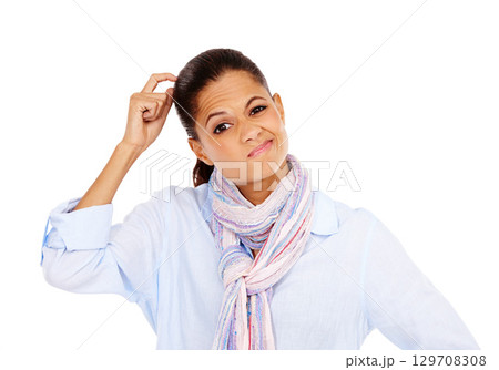 Confused, thinking and portrait of a woman in a studio with a question, idea or thought. Puzzled, wondering and female model from Mexico scratching her head while isolated by a white background. 129708308