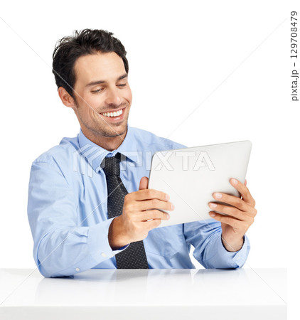 Social media, video and businessman reading on tablet for work, communication and app. Website, contact and happy executive man with tech for connectivity, wifi and online news on a white background 129708479