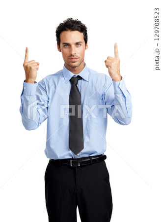 Portrait of businessman, hands and pointing up on studio background to branding, marketing or advertising space. Corporate worker, employee and finger showing on mock up backdrop for promotion deal Portrait of businessman, hands and pointing up on studio background to branding, marketing or advertising space. Corporate worker, employee and finger showing on mock up backdrop for promotion deal 129708523