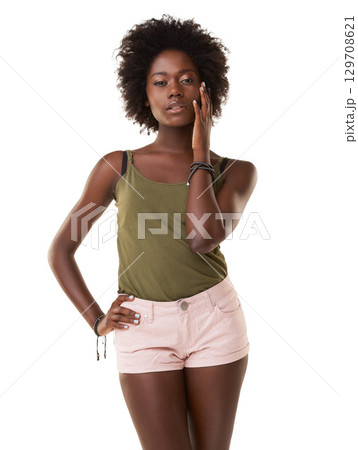 Fashion, beauty and portrait of black woman on a white background in urban, stylish and trendy clothes. Cosmetics, skincare and Jamaican girl fashion model in studio for confidence, elegant and style Fashion, beauty and portrait of black woman on a white background in urban, stylish and trendy clothes. Cosmetics, skincare and Jamaican girl fashion model in studio for confidence, elegant and style 129708621