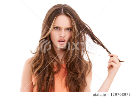Woman portrait, stress or angry with messy hairstyle on isolated white background for split ends, keratin treatment or grooming. Confused beauty model, brunette or problem hair in hair loss marketing Woman portrait, stress or angry with messy hairstyle on isolated white background for split ends, keratin treatment or grooming. Confused beauty model, brunette or problem hair in hair loss marketing 129708972