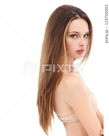 Hair care, cosmetic and portrait of a woman in studio with a keratin hair treatment. Beauty, health and female model with hair style isolated by white background with mockup space Hair care, cosmetic and portrait of a woman in studio with a keratin hair treatment. Beauty, health and female model with hair style isolated by white background with mockup space 129708983