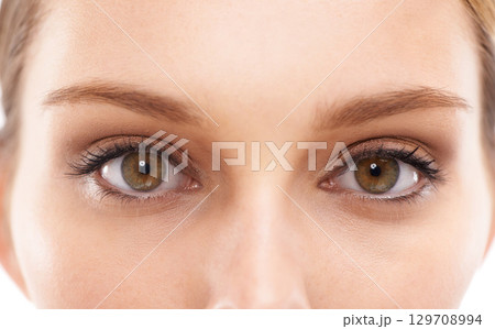 Face, eyes and vision with a woman in studio on a white background for eyecare or prescription eyewear. Microblading, makeup and zoom with a young female looking closeup while testing fher eyesight Face, eyes and vision with a woman in studio on a white background for eyecare or prescription eyewear. Microblading, makeup and zoom with a young female looking closeup while testing fher eyesight 129708994