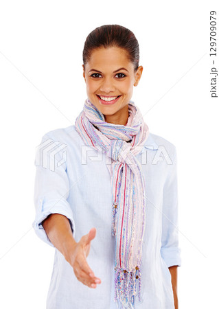 Portrait, handshake and welcome with a black woman in studio isolated on a white background during a meeting. Deal, support and hiring with a young female offering a hand shake on blank space 129709079