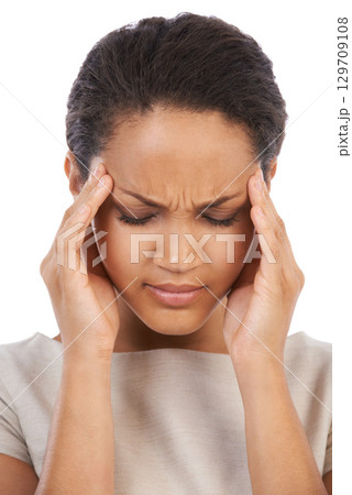 Headache, business woman and stress of a model face feeling anxiety and job burnout. White background, isolated and black woman with fatigue from work, overtime and corporate tax job problem Headache, business woman and stress of a model face feeling anxiety and job burnout. White background, isolated and black woman with fatigue from work, overtime and corporate tax job problem 129709108