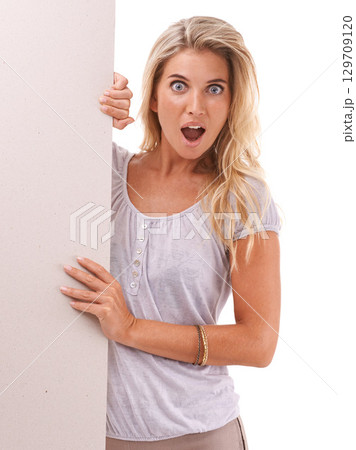 Mockup portrait, surprise or woman with poster, placard or billboard for sales advertising marketing. Studio sign, banner space and model girl shocked over discount promotion deal on white background 129709120