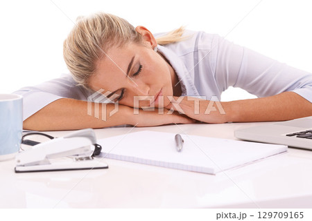 Sleeping, tired business woman with notebook for planning, writing and working at desk on white background studio. Worker, employee or writer with fatigue, mental health problem and depression Sleeping, tired business woman with notebook for planning, writing and working at desk on white background studio. Worker, employee or writer with fatigue, mental health problem and depression 129709165