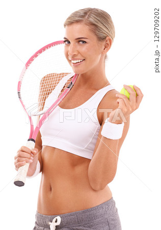Tennis woman, studio portrait and racket with smile for health, sport and fitness by white background. Happy tennis player, focus and tennis ball in hand while isolated for training, wellness or goal Tennis woman, studio portrait and racket with smile for health, sport and fitness by white background. Happy tennis player, focus and tennis ball in hand while isolated for training, wellness or goal 129709202