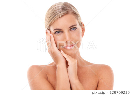 Cosmetic, skin treatment and portrait of a young woman calm about skincare and natural face glow. White background, hands and beauty of a model happy about facial care and skin care in studio Cosmetic, skin treatment and portrait of a young woman calm about skincare and natural face glow. White background, hands and beauty of a model happy about facial care and skin care in studio 129709239