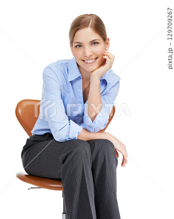 Businesswoman, portrait and sitting on chair in studio, white background and happiness. Happy female worker, model and office chair of young employee, entrepreneur and motivation in corporate career 129709267