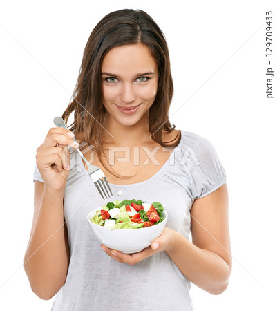 Health girl and portrait with wellness salad for diet nutrition with cheerful and happy smile. Beautiful dieting model excited for healthy food lifestyle on isolated white background. Health girl and portrait with wellness salad for diet nutrition with cheerful and happy smile. Beautiful dieting model excited for healthy food lifestyle on isolated white background. 129709433
