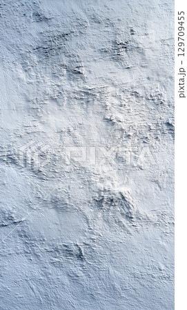 Wall with a rough texture and a few holes Wall with a rough texture and a few holes 129709455