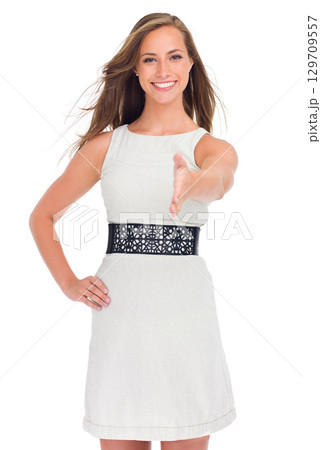 Portrait, handshake and meeting with a business woman in studio isolated on a white background for a deal or agreement. Thank you, interview and partnership with a female employee saying in welcome 129709557