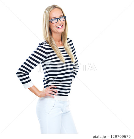 Portrait, mockup and fashion with a model woman in studio isolated on a white background while standing hands on hips. Glasses, style and mock up with a young female posing to promote blank space 129709679