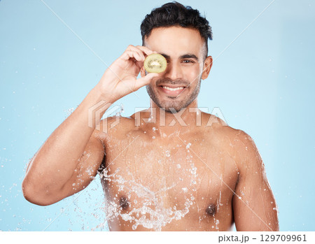 Skincare, beauty and water splash, man with fruit for vitamin c facial detox for healthcare, natural healthy skin and smile. Water, wellness and sustainability, organic luxurycleaning and grooming. Skincare, beauty and water splash, man with fruit for vitamin c facial detox for healthcare, natural healthy skin and smile. Water, wellness and sustainability, organic luxurycleaning and grooming. 129709961