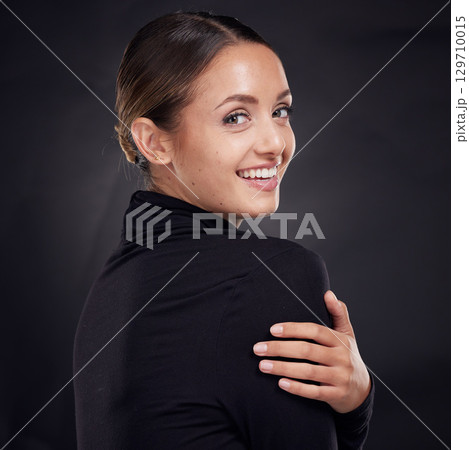 Skincare, portrait or woman in studio with a happy smile after facial grooming routine isolated on black background. Beauty glow, face or girl model smiling with marketing or advertising mockup space 129710015