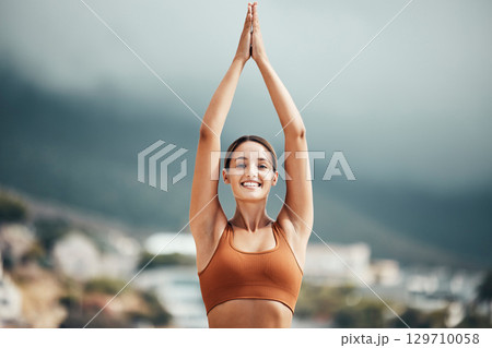 Fitness, stretching and portrait of woman in city for healthy lifestyle, wellness and exercise in nature. Sports, workout and happy girl stretch arms outdoors for cardio, yoga training and pilates 129710058