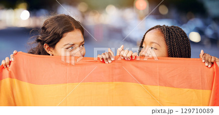 Rainbow flag, LGBTQ and happy lesbian couple with love at a freedom, pride or community parade in the city. Celebration, interracial and gay women with commitment at a LGBT sexuality event in town. Rainbow flag, LGBTQ and happy lesbian couple with love at a freedom, pride or community parade in the city. Celebration, interracial and gay women with commitment at a LGBT sexuality event in town. 129710089