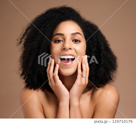Face portrait, skincare and surprise of black woman in studio isolated on a brown background. Makeup cosmetics, wow and happy female model shocked at facial transformation after spa skin treatment. Face portrait, skincare and surprise of black woman in studio isolated on a brown background. Makeup cosmetics, wow and happy female model shocked at facial transformation after spa skin treatment. 129710176